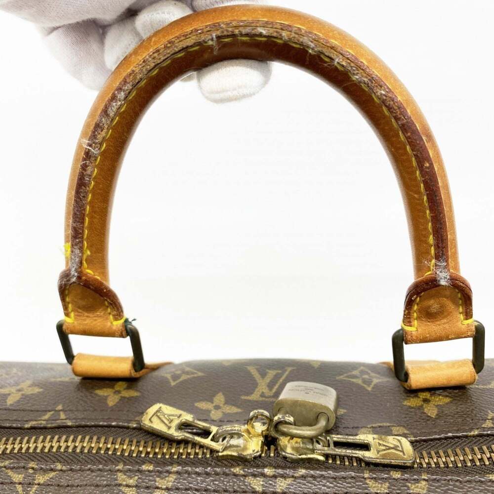 LOUIS VUITTON Brown Monogram Keepall 55 Boston Bag - Picture 8 of 13